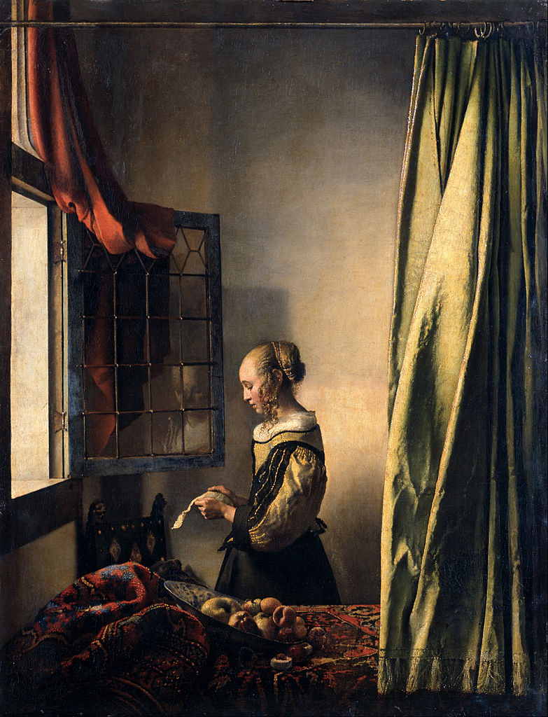 Muchacha leyendo una carta junto a una ventana abierta de Johannes Vermeer. 1657